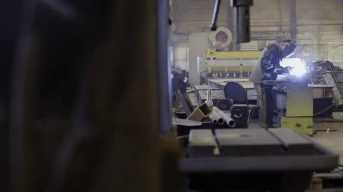 Worker with protective mask welding metal Stock Footage 76150793