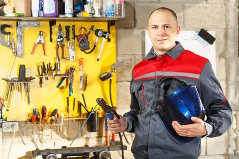 Worker with protective mask welding Stock Photos