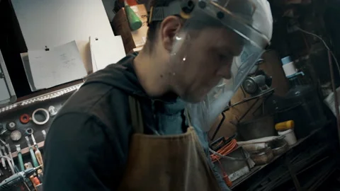 Worker with protective mask in workshop Stock Footage 142191616