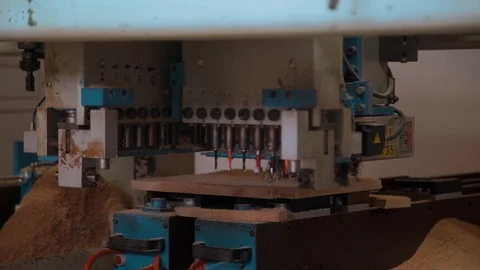 Worker pulls the workpiece from the CNC machine on wood. CNC machine for wood Stock Footage 102677933