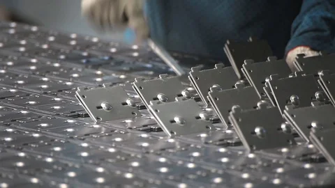 Worker pulls the workpiece at the factory. Steel billets are picked out of the Video stock 95091278