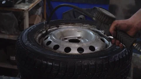 The worker pumps the wheel Stock-Footage 84284333