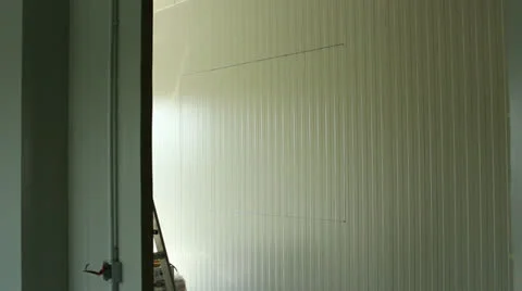 A worker push the cut-out of a window Stock Footage 23543802