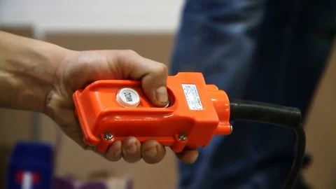 Worker push the start buton Stock Footage 128929366