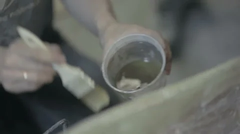 Worker to put varnish on the surface of the item Video stock 68067268