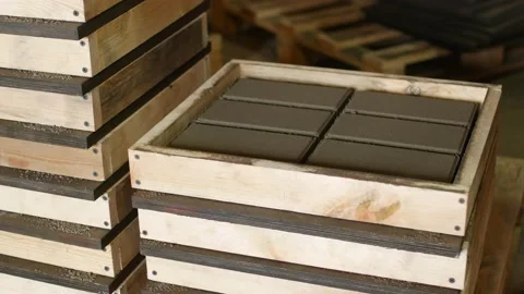 Worker puts the finished interlocking concrete pavers Video stock 95112851