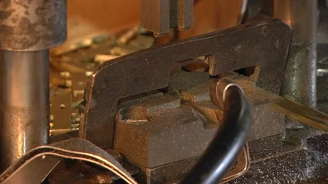 The worker puts in a press bronze tip. Stock Footage 96393278