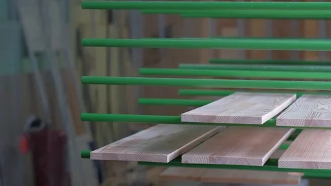 Worker Puts Ready-Made Wooden Shelf in Workshop of Furniture Video stock 74260626
