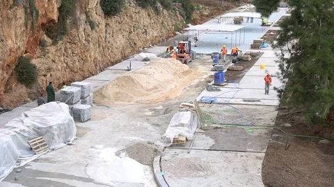 Worker puts sidewalk tile closeup Stock Footage 86887931