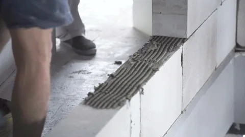 Worker puts the units in the house Stock Footage 90189840