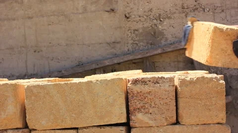 Worker putting big bricks Stock Footage 50610312