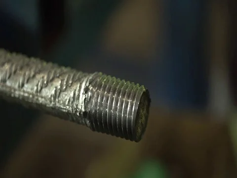 Worker Putting Red Coupler On A Construction Steel Bar - Close Up Stock Footage 79083538