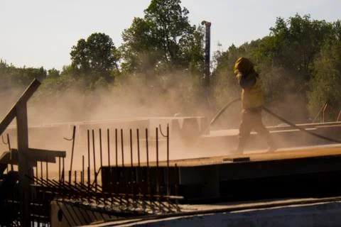 Worker in red dust Stock Photos