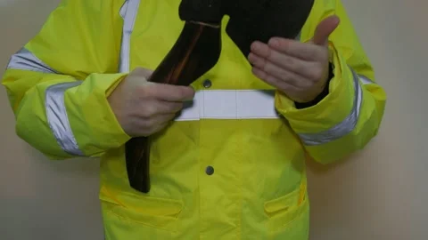 Worker In Reflective Uniform With An Ax 库存影片 220016828