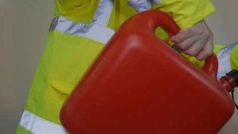 Worker In Reflective Uniform With Fuel Can 库存影片 220016809