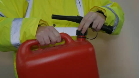 Worker In Reflective Uniform With Fuel Can Stock-Footage 220016817