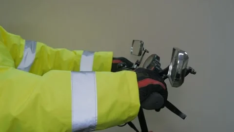 Worker in reflective uniform on scooter Stock Footage 220433269