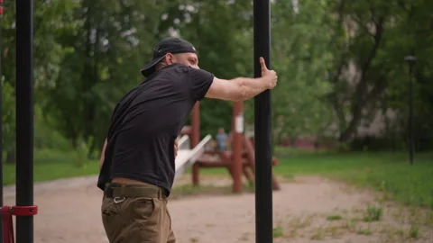 Worker Relaxes Peacefully, Man Rests On Pole Calmly, Individual Takes Break Video stock 327169288