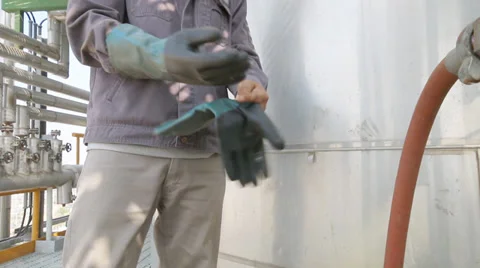 Worker to remove gloves Stock-Footage 34356775