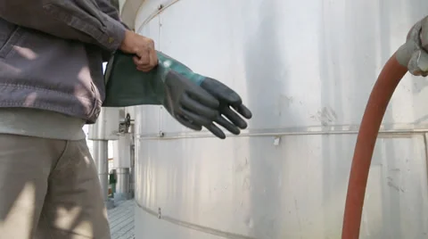 Worker to remove gloves Stock Footage 34357665