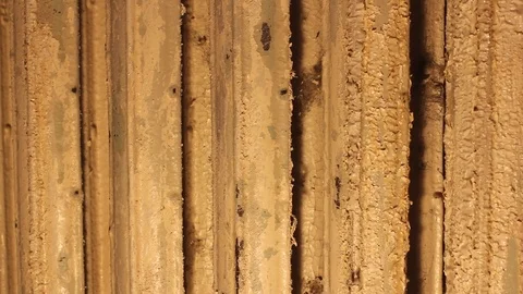 Worker remove old paint on metal water heating radiator. Stock Footage 93516062