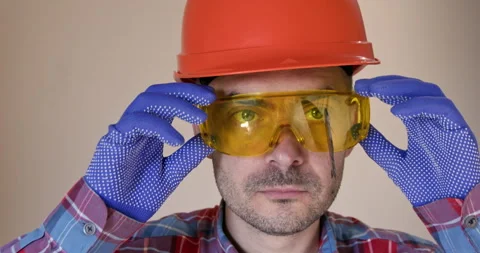 Worker removes goggles after accident with broken saw disk Vidéo 258503976