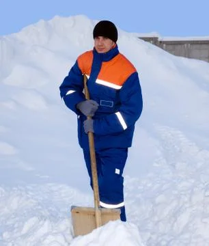 The worker removes the snow Stock Photos
