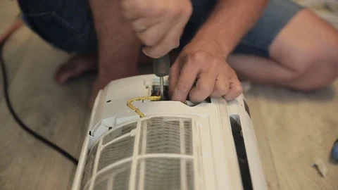 Worker Repair Air Conditioner Stock Footage 73899484