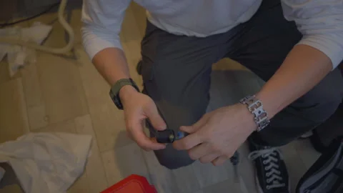 Worker repair dishwasher in the kitchen. Stock Footage 250441692