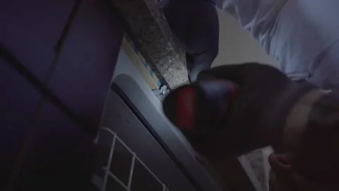 Worker repair dishwasher in the kitchen. Stock Footage 252262084