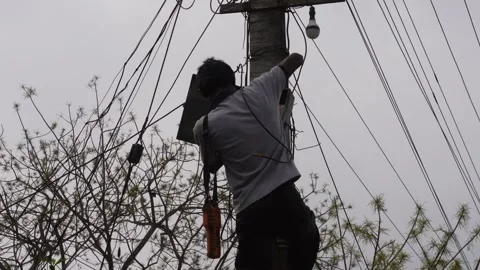 Worker Repairing Electrical Wires Stockbeeldmateriaal 333917816