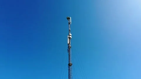 A worker repairs a communications tower Video stock 231296163