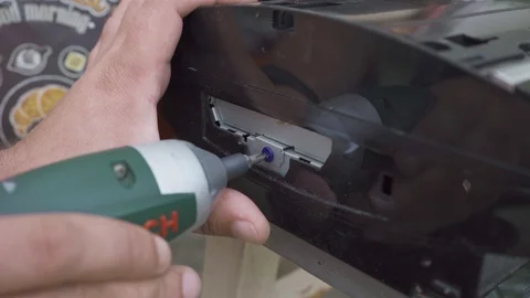 Worker repairs a game console close-up Stock Footage 108520897