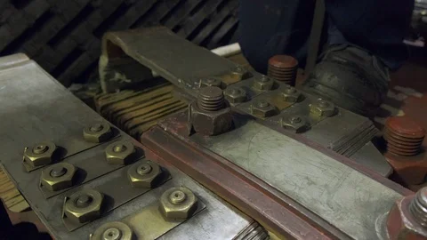 Worker repairs nuts with a hammer Video stock 128219739