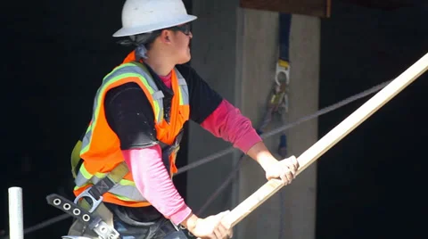 Worker repairs a structural element at construction site Stock Footage 34372818