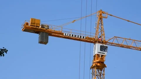 Worker repairs tower crane Stock Footage 221705377