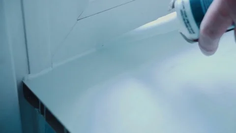 Worker repairs a window Stock Footage 81502010