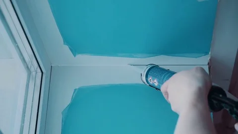 Worker repairs a window Stock Footage 81502187