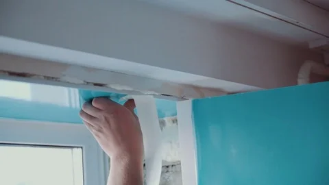 Worker repairs a window Stock Footage 81502195