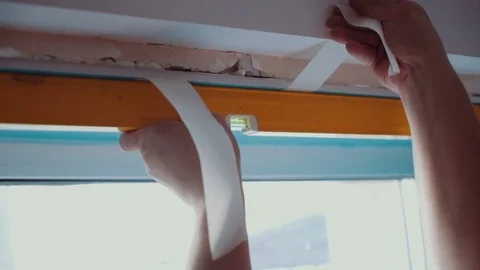 Worker repairs a window Stock Footage 81502294