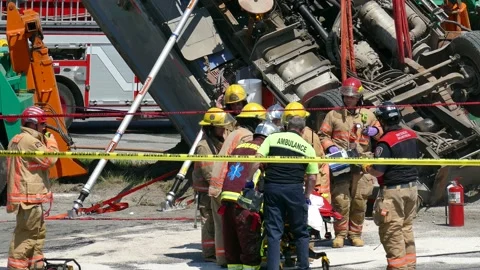 Worker rescued after massive physical rescue Stock Footage 133268935