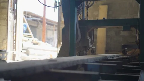 The Worker Returns Back to The Sawmill With a Circular Saw Types of Cutting Logs Stock Footage 76644301