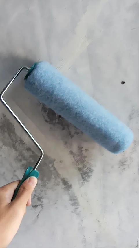 A worker roller paint A wall Stock Footage 319028182