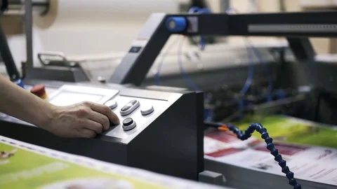 Worker s hand using gear at printing plant machine 스톡 동영상 75206950