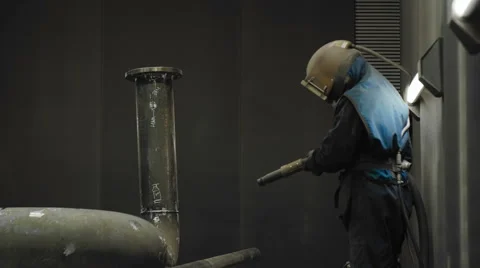 Worker Sandblasting Gas Pipe Vídeos de archivo 64686950