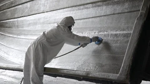 Worker sanding down a boat's frame 3 Stock Footage 162345714