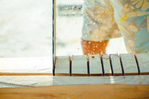 Worker sawing a chainsaw tree Stock Photos
