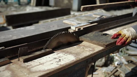 Worker sawing on a circular saw Stock Footage 286152337