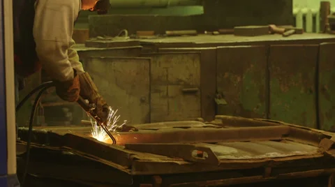 Worker sawing the metal Stock Footage 33402815