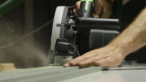 Worker sawing a piece of plastic Stock Footage 60639967